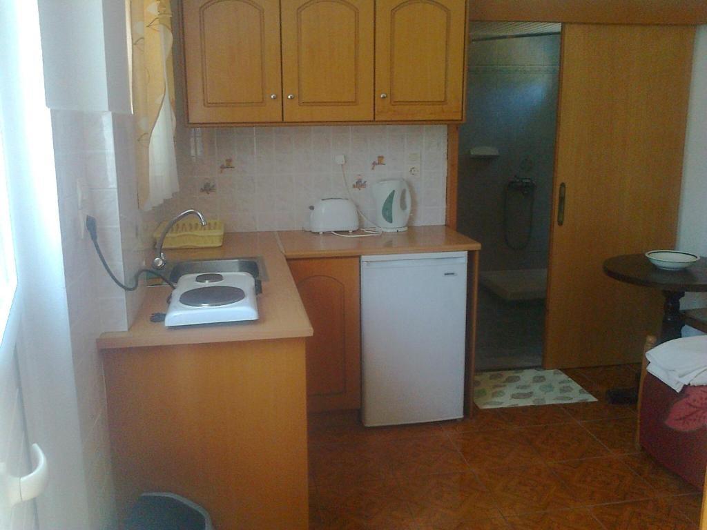 Dionysia Apartments Kéfalos Quarto foto